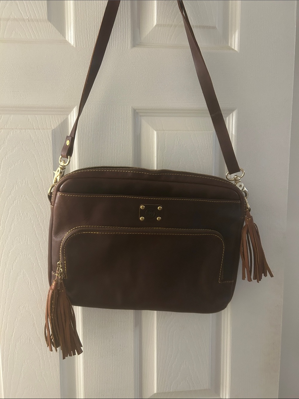 Brown Leather Messenger Bag with Tassel Accent by